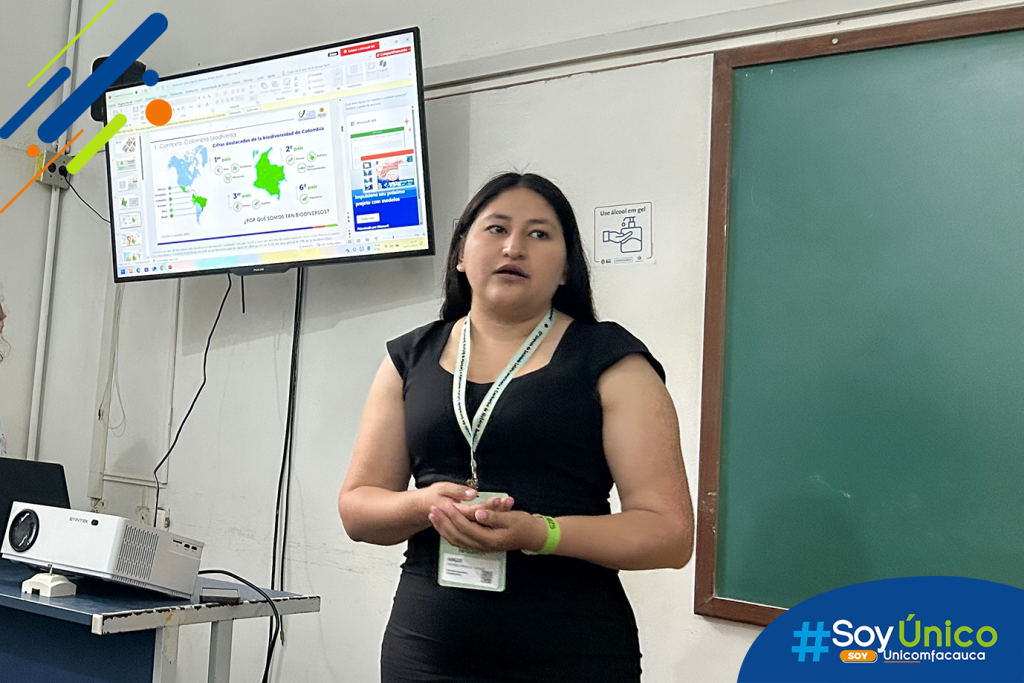 Jóven investigadora, Angie Daniela Valencia Cuarán, realizando la ponencia en SOLCHA, Brasil.